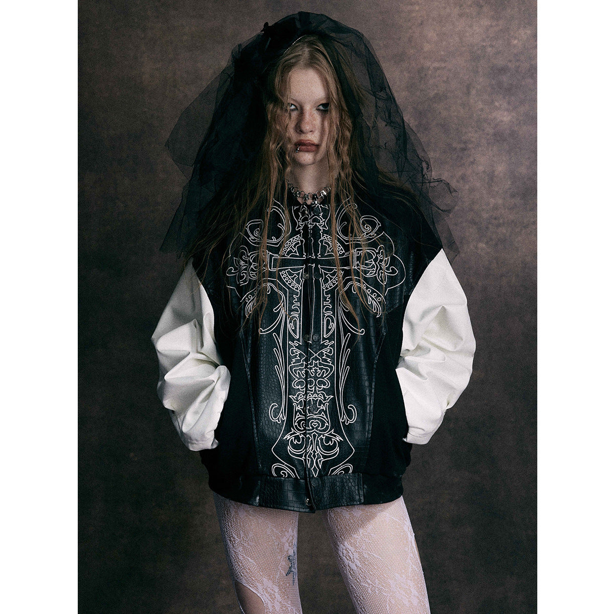 Cross embroidered patchwork leather jacket